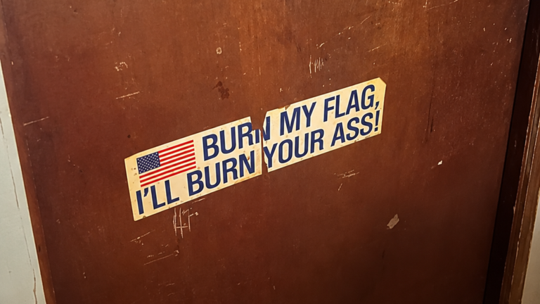 Patriotic sign inside Boschertown Bar & Grill