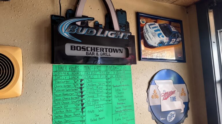 Boschertown Bar & Grill menu wall and beer signs