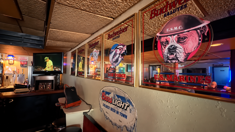 Military and beer memorabilia inside Boschertown Bar & Grill