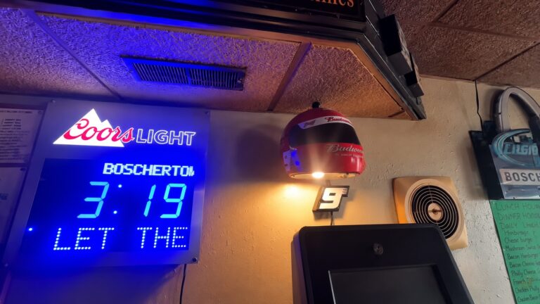 Boschertown Bar & Grill scoreboard and beer signs